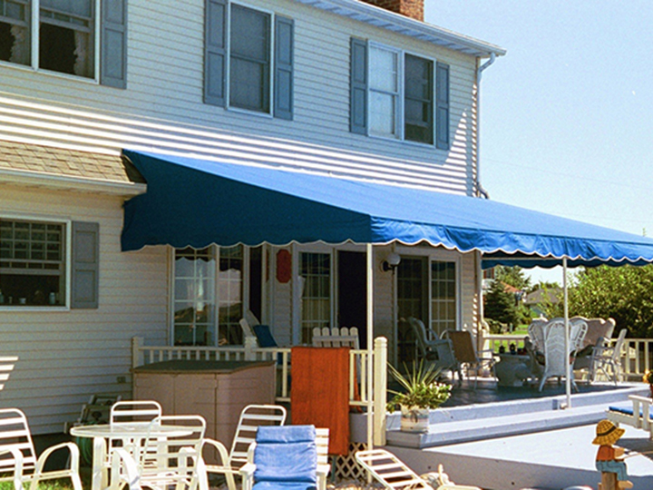 blue awning extended out over a patio